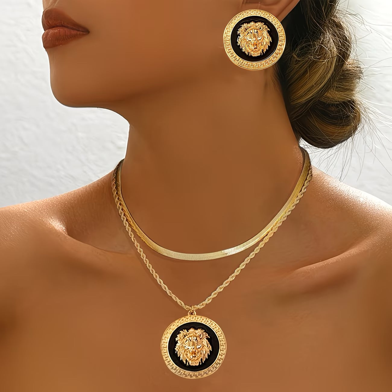 2-teiliges Set mit modischem Löwenkopf-Tropfdesign